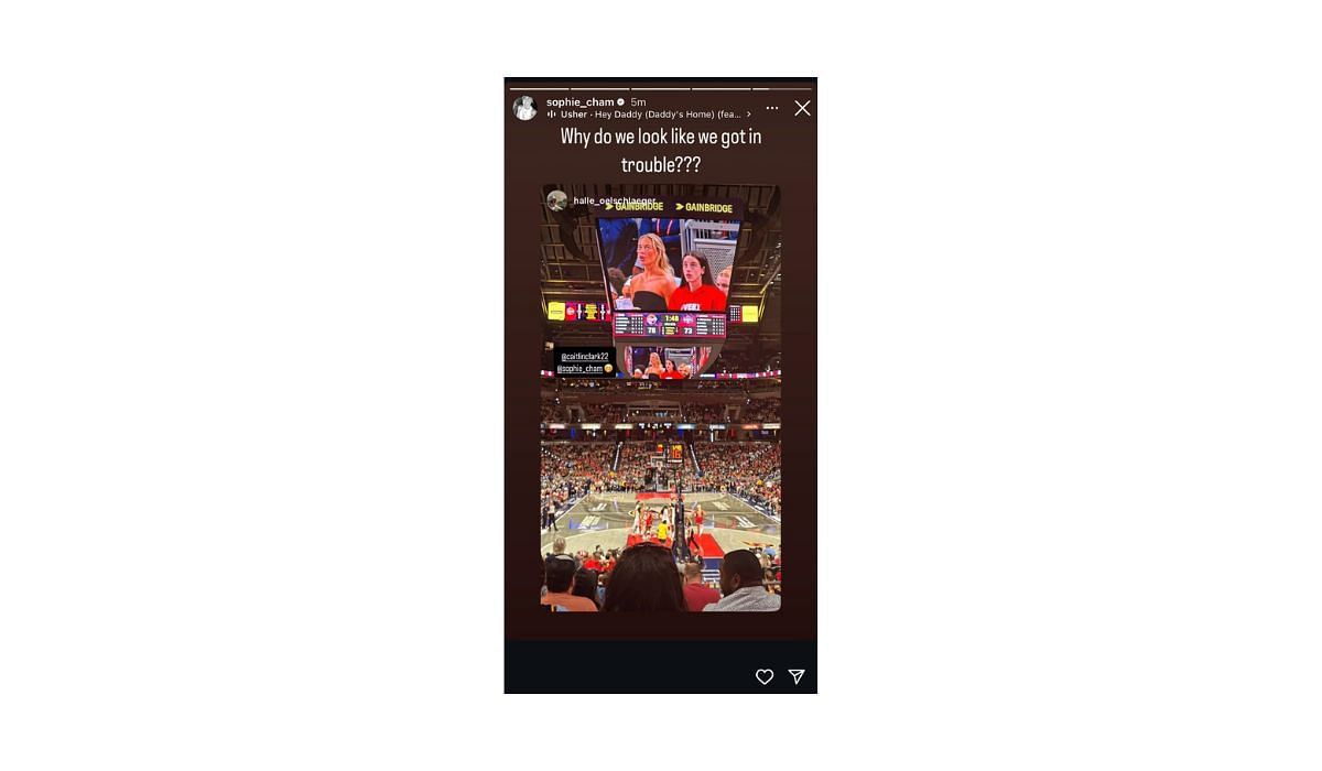 Sophie Cunningham reacts to her viral picture with Caitlin Clark during a WNBA game
